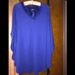 Woman’s top. Perfect with leggings.